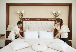 chambermaid woman team at hotel service